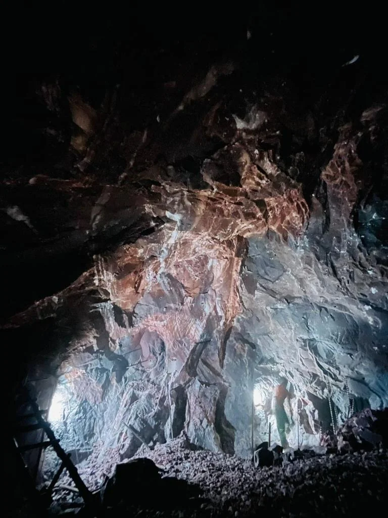 Natural salt-bearing rock face photographed inside the mine